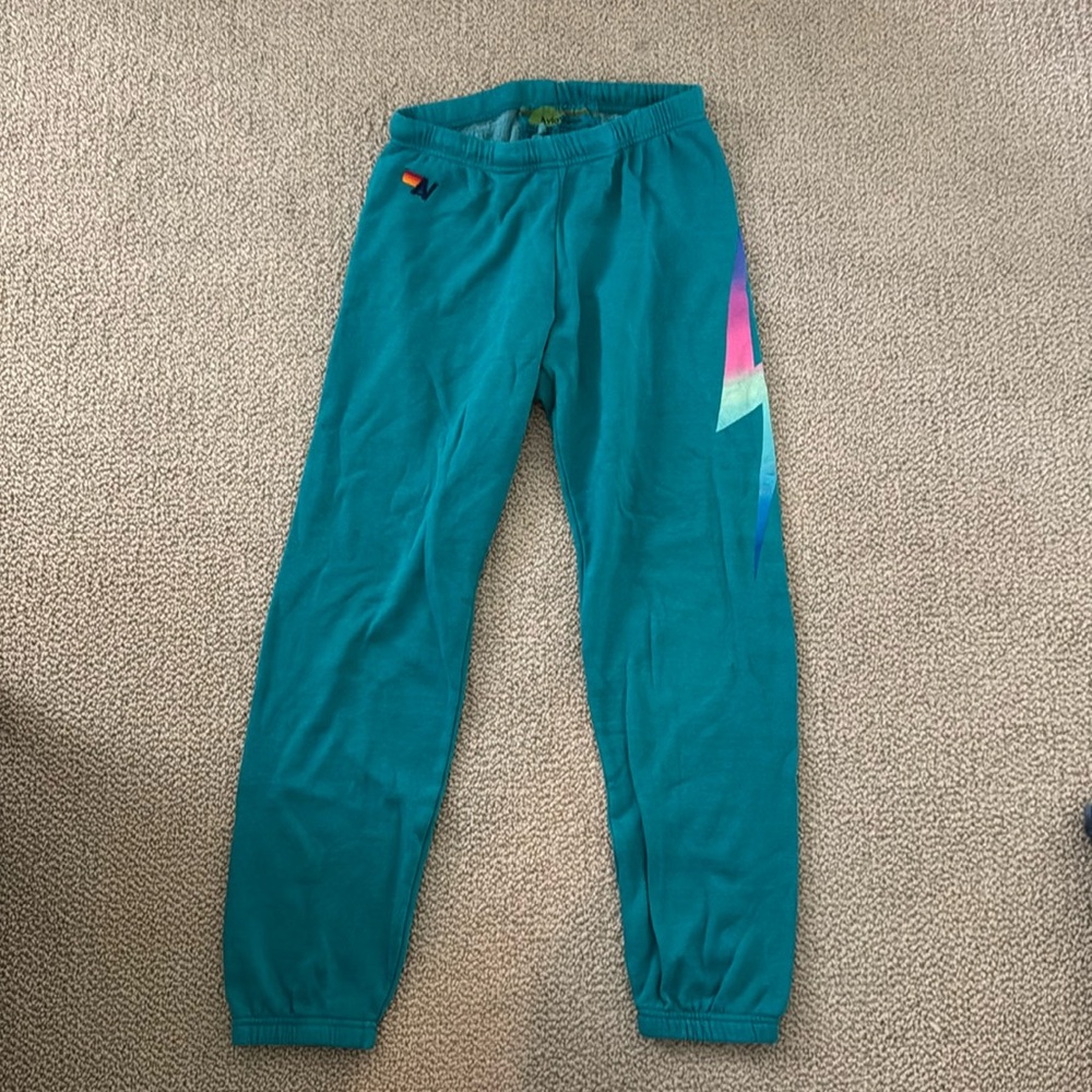 Aviator Nation Sweatpants with a Lightning Bolt.
